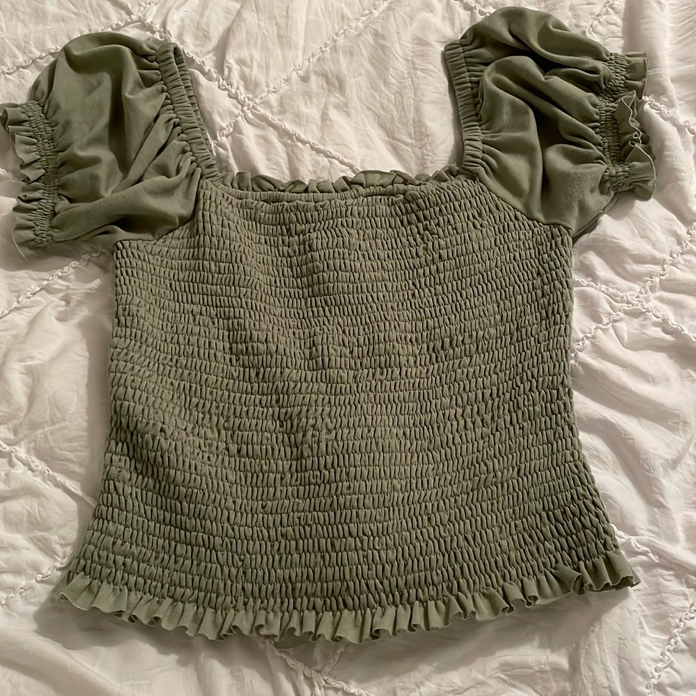Very soft light green off shoulder top